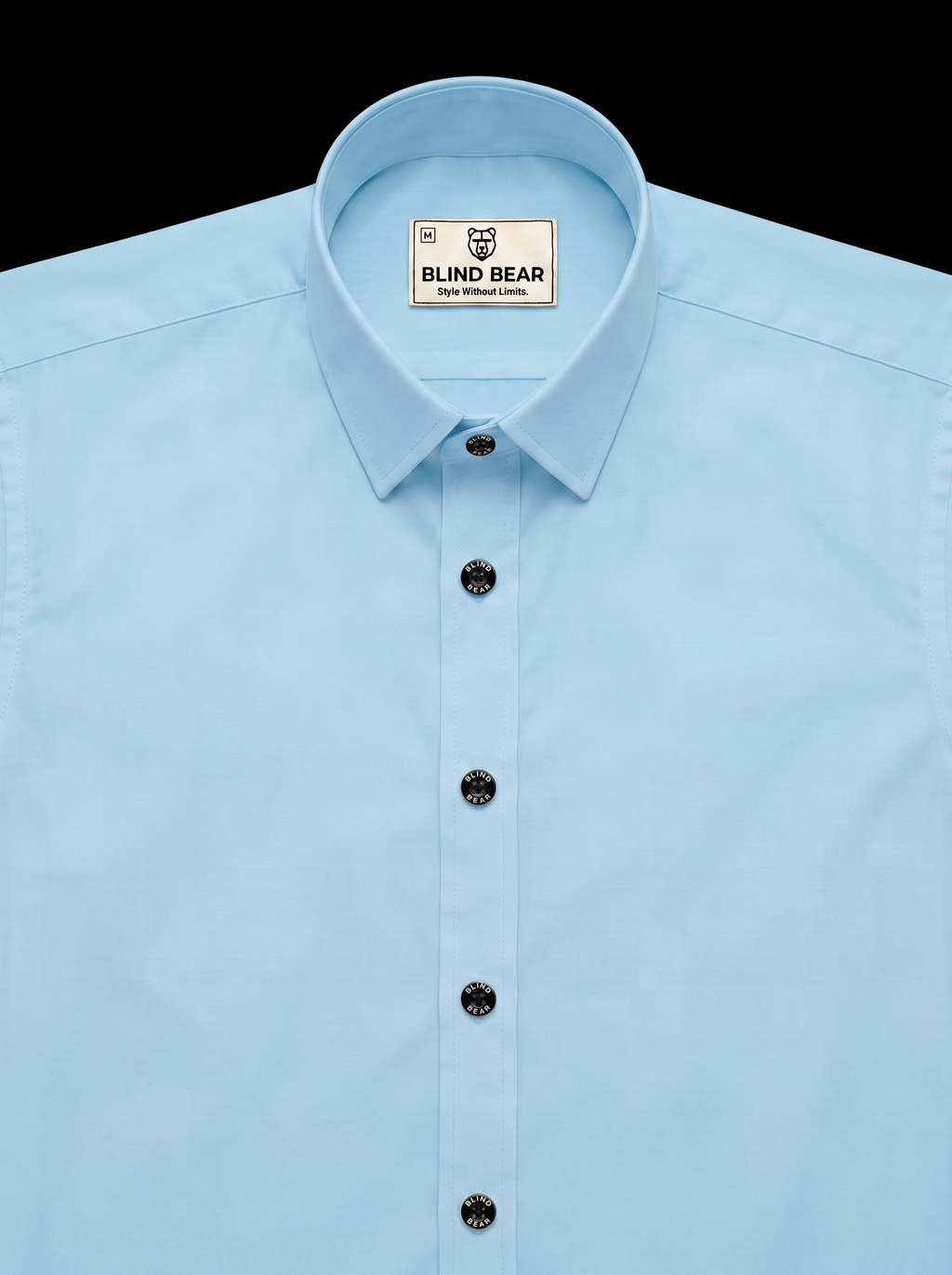 A light blue long-sleeve dress shirt by Blind Bear, featuring a classic pointed collar, black buttons, and a visible brand label inside the collar, set against a solid black background.